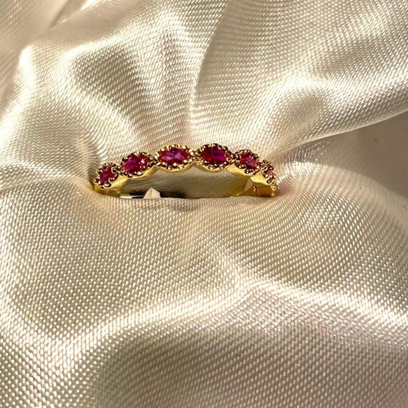 ANEL TRABALHADO   COM CRISTAL E  ZIRCONIAS FUKCIA