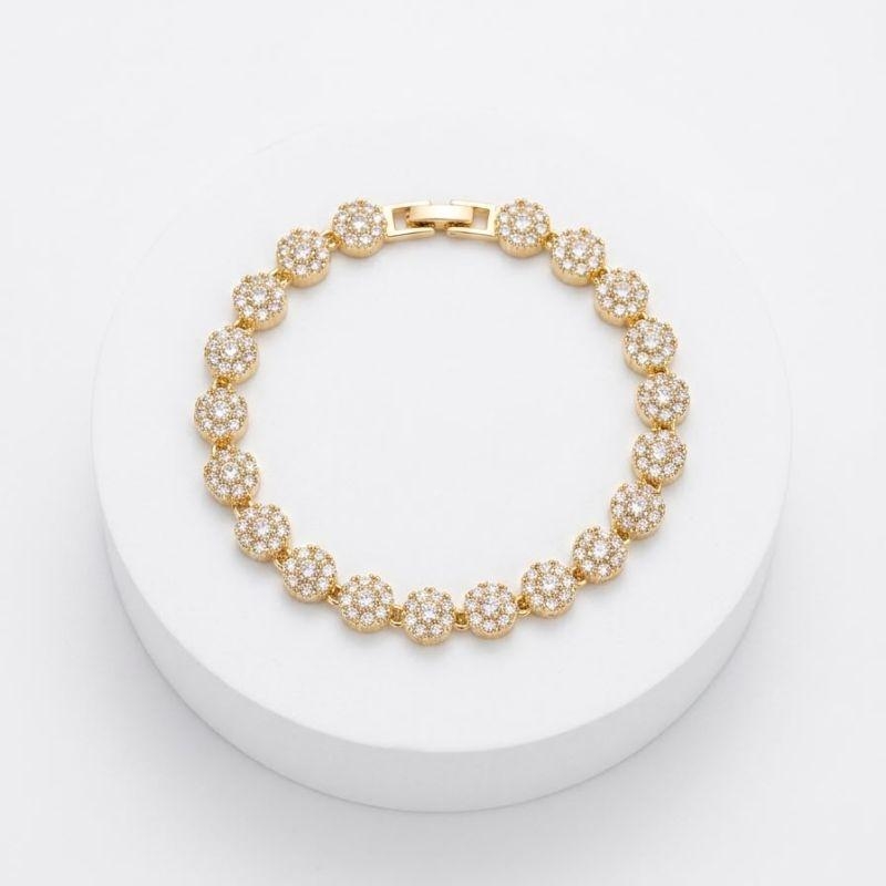 PULSEIRA COM ZIRCONIAS E FUNDO BRANCO