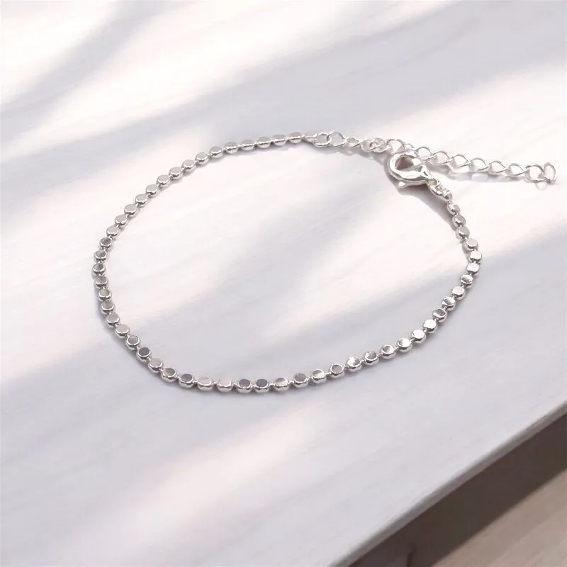 PULSEIRA BOLINHAS ACHATADAS LISA