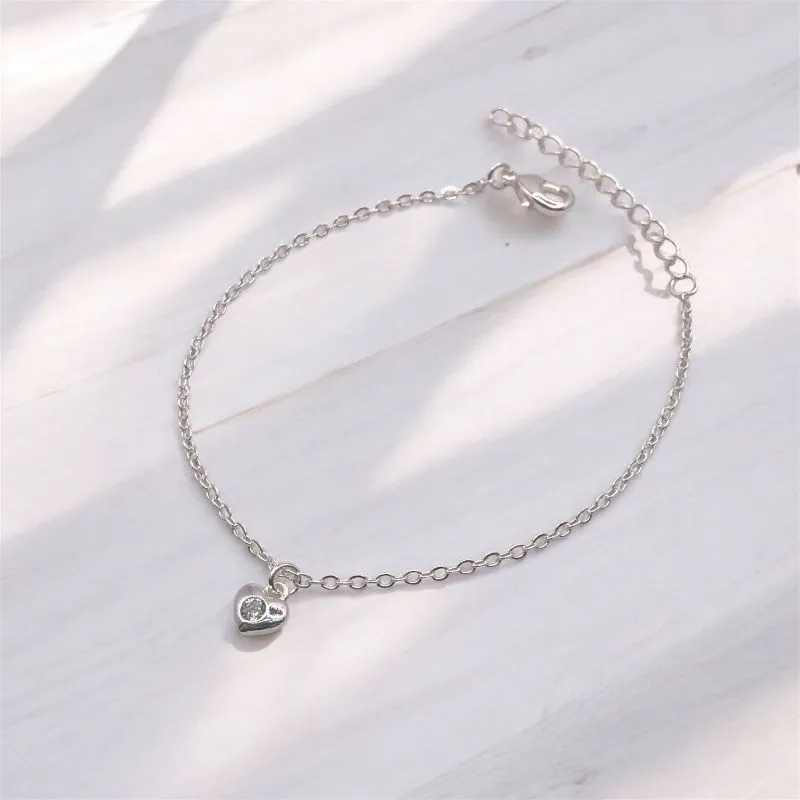 PULSEIRA ELO PORTUGUES COM PINGENTE CORAÇÃO E CENTRO EM ZIRCONIA