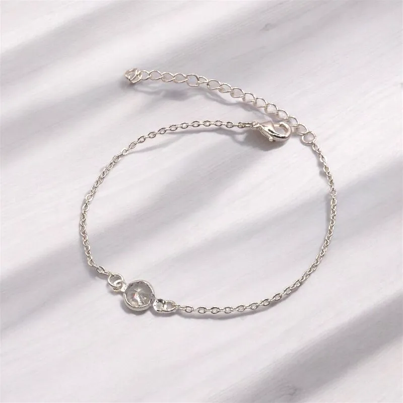 PULSEIRA ELO PORTUGUES COM PINGENTE PONTO DE LUZ CRISTAL