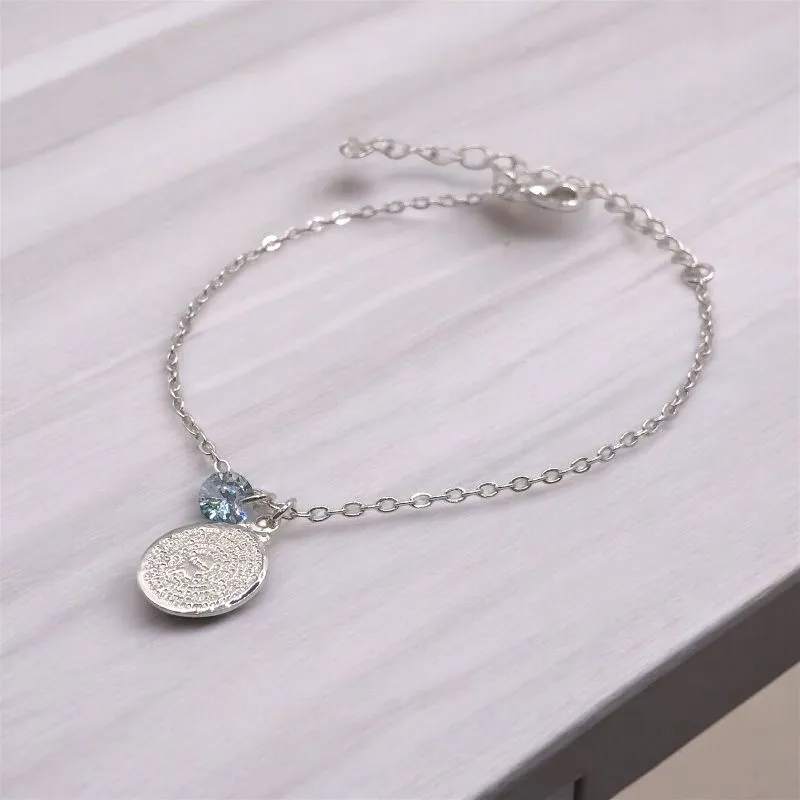 PULSEIRA ELO PORTUGUES COM PINGENTE PONTO DE LUZ CRISTAL/MEDALHA EM CHAPA PAI NOSSO