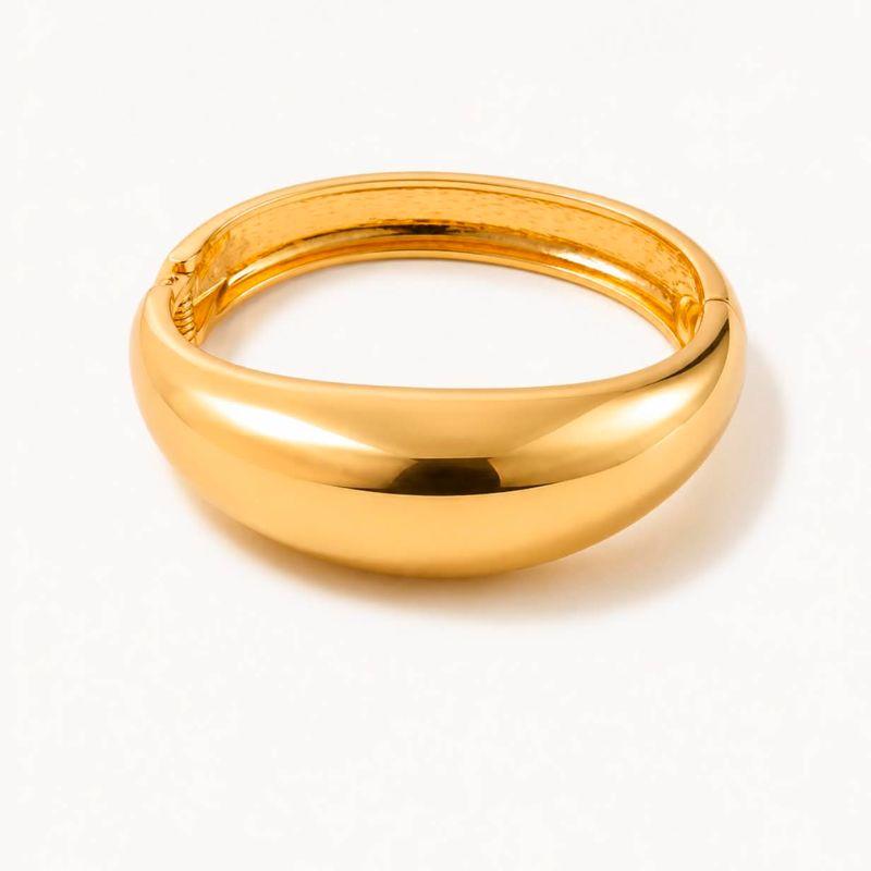 BRACELETE RIGIDO DOURADO COM DESIGN MODERNO