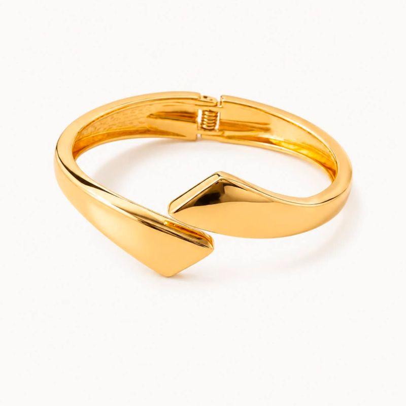 BRACELETE RIGIDO DOURADO COM DESIGN MODERNO